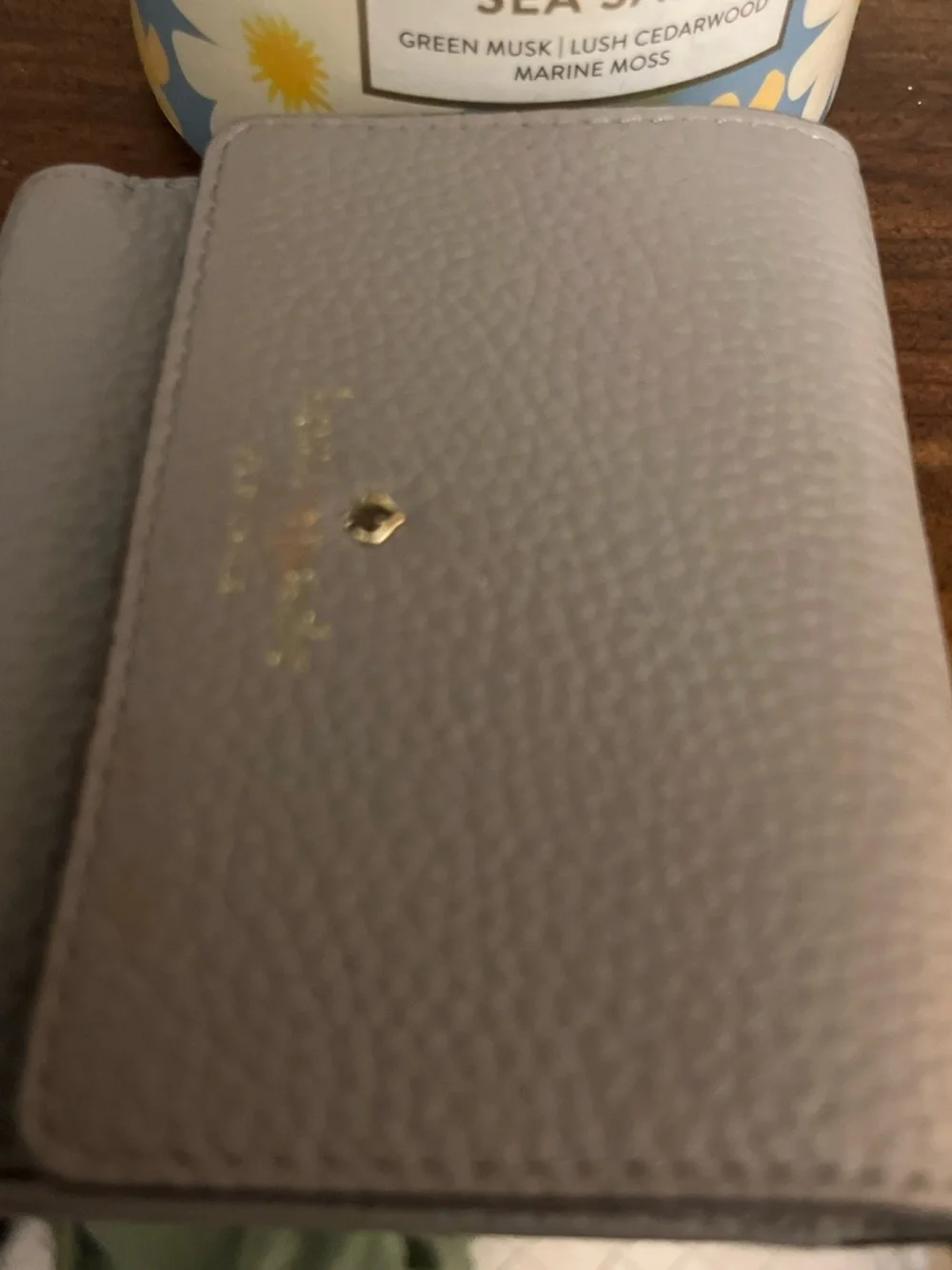 kate spade small pebbled wallet in light gray with gold logo